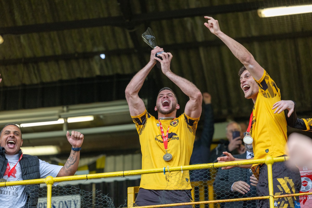Prescot Cables winning a trophy.jpg
